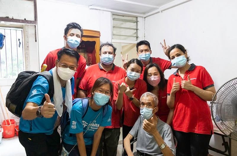 Volunteers celebrating after a build day